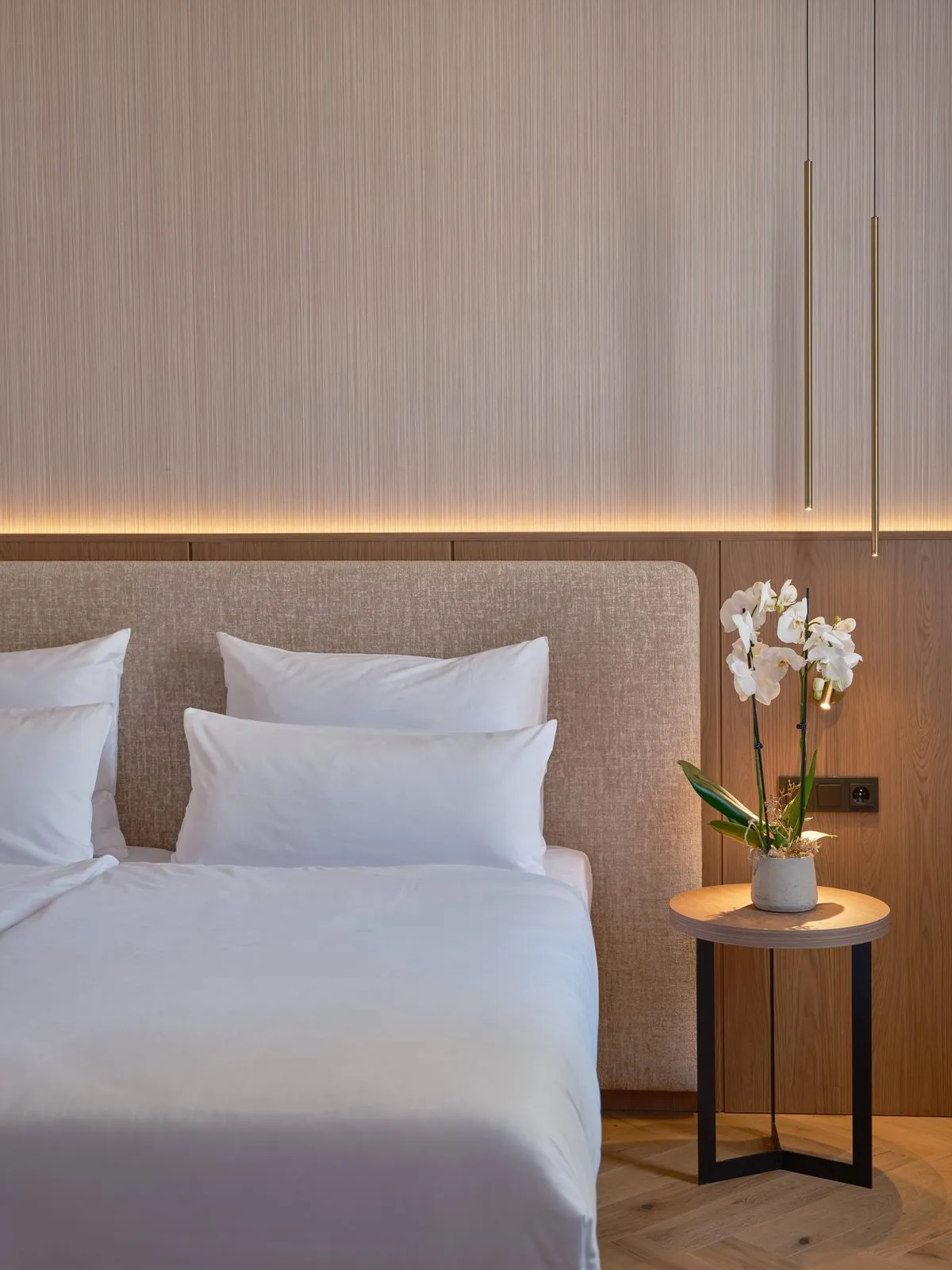 Bed and bedside table – The Benedict Boutique Hotel
