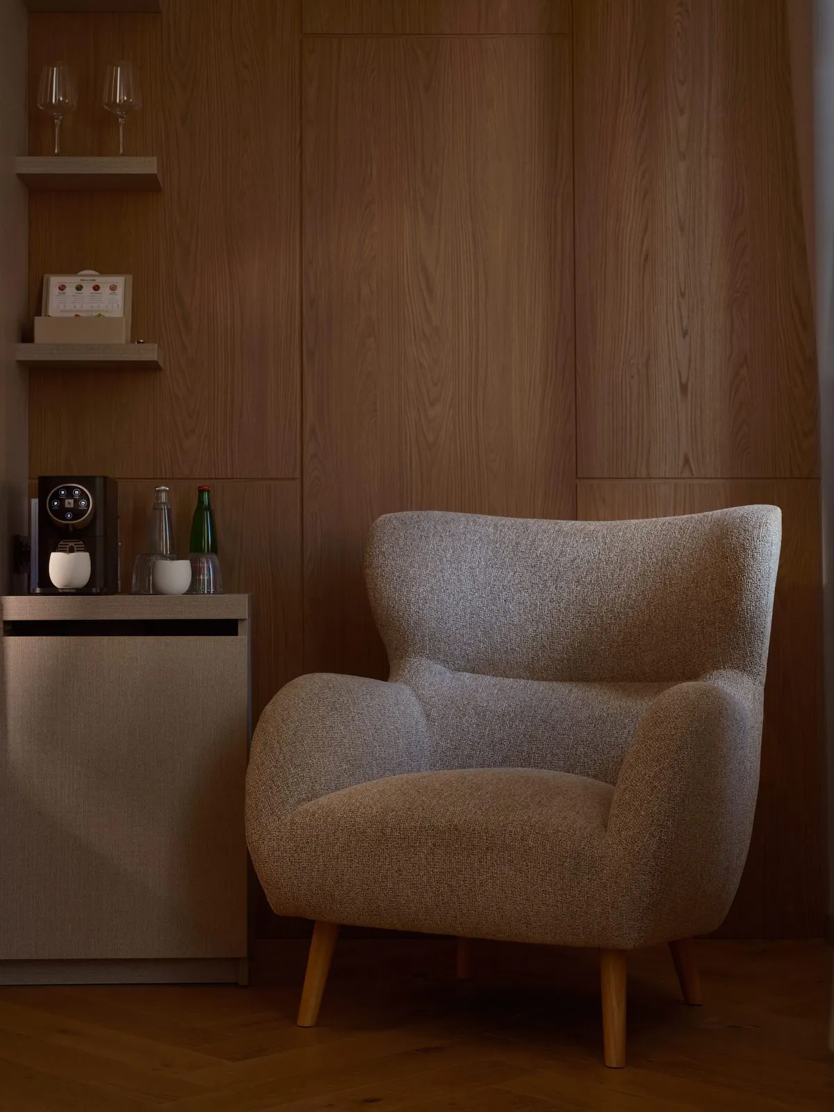 Armchair and minibar – The Benedict Boutique Hotel
